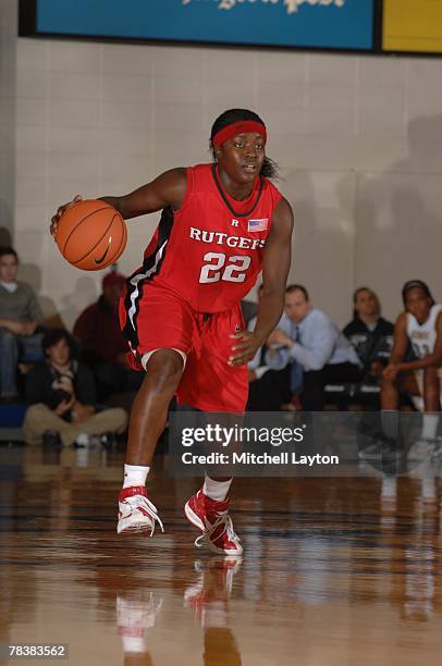 Matee Ajavon of the Rutgers Scarlet Knights dribbles the ball during a game against the George Washington Colonials at Smith Center on November 18,...