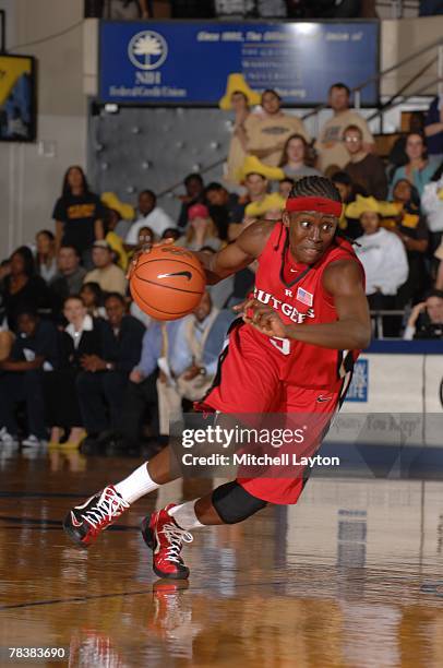 Essenece Carson of the Rutgers Scarlet Knights drives the basket during a game against the George Washington Colonials at Smith Center on November...