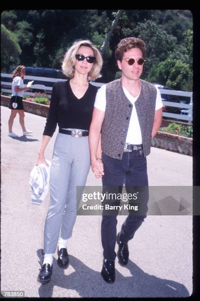 Musician Richard Marx and wife Cynthia Rhodes pose at the Pediatric AIDS Foundation Fundaiser June 9, 1996 in Los Angeles, CA. The Pediatric AIDS...