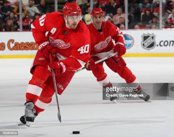 Henrik Zetterberg of the Detroit Red Wings skates up ice during a game against the Minnesota Wild on December 7, 2007 at Joe Louis Arena in Detroit,...