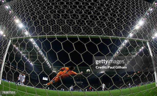 Rustu Recber of Besiktas makes a save from a shot by Ricardo Quaresma of Porto during the UEFA Champions League Group A match between Porto and...