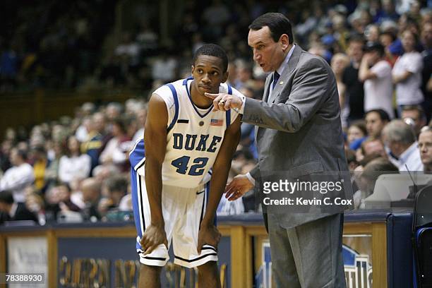 Lance Thomas of the Duke Blue Devils listens to head coach Mike Krzyzewski during the game against the Eastern Kentucky Colonels at Cameron Indoor...
