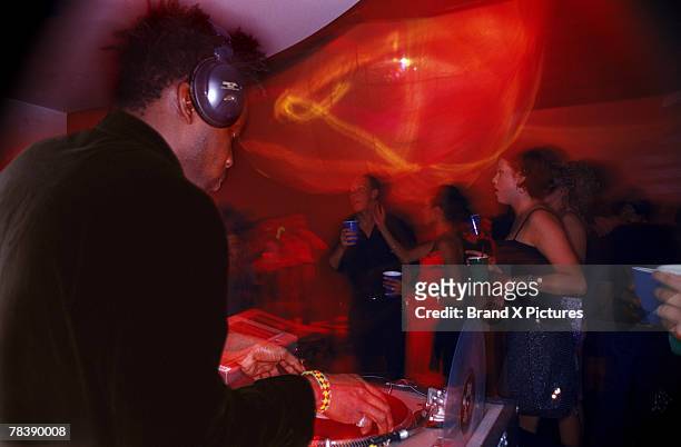 dj playing records - black dj stock pictures, royalty-free photos & images