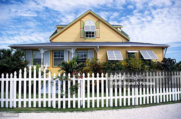 house with picket fence, grand bahama, bahamas - grand bahama stock pictures, royalty-free photos & images