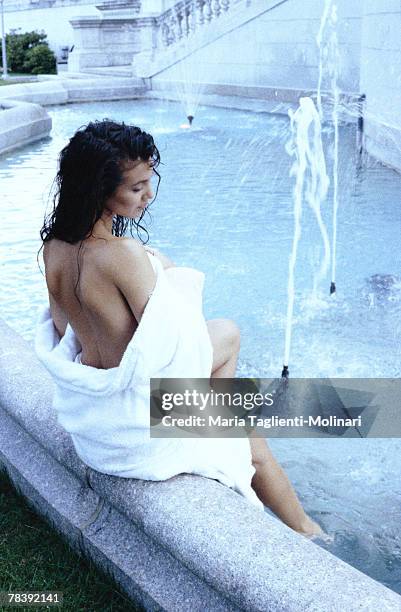 woman in towel - women skinny dipping stockfoto's en -beelden