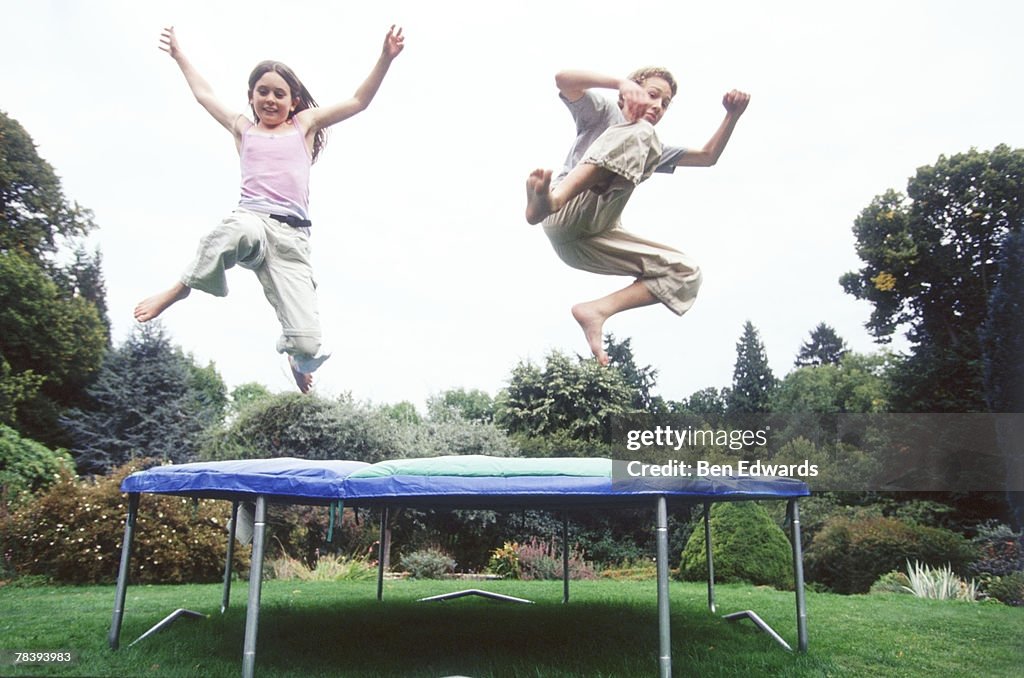 Children having fun on trampoline