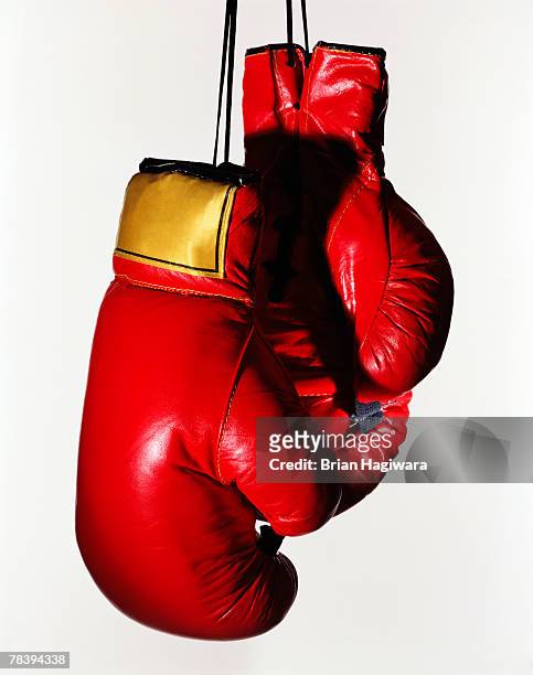 red boxing gloves on white - boxing ring empty stock pictures, royalty-free photos & images