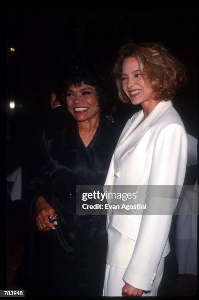 Performer Eartha Kitt stands with her daughter Kitt Shapiro at Donald Trump's 50th birthday celebration June 13, 1996 in New York City. Real estate...