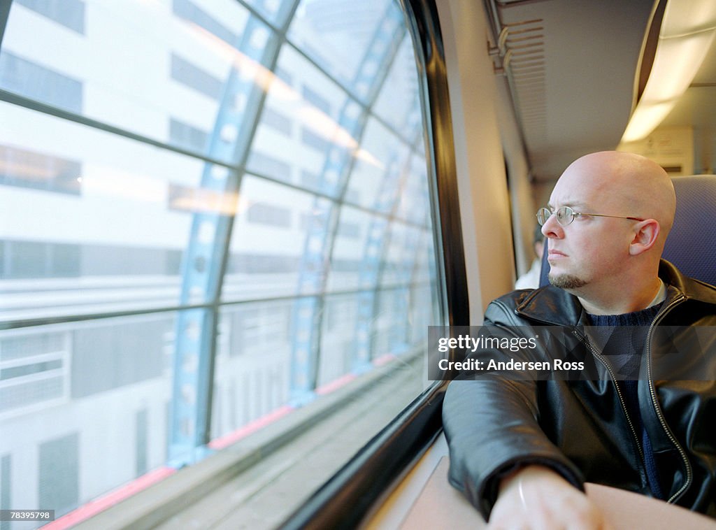 Man on commuter train