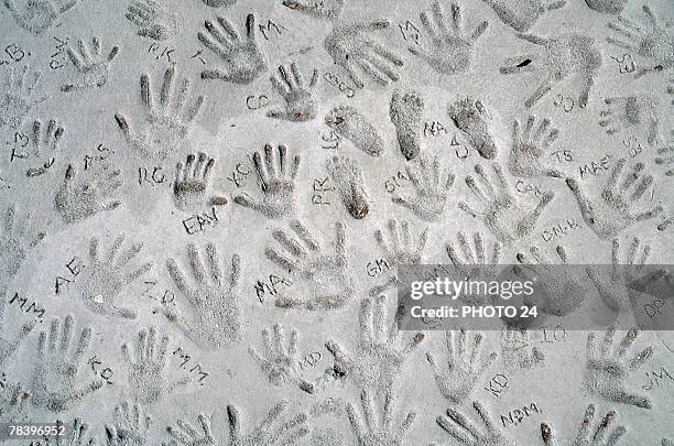 hand prints in concrete - hand prints in cement stock pictures, royalty-free photos & images