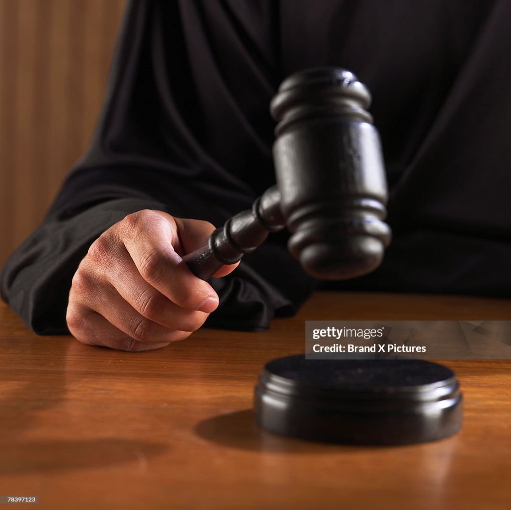 Judge hitting gavel