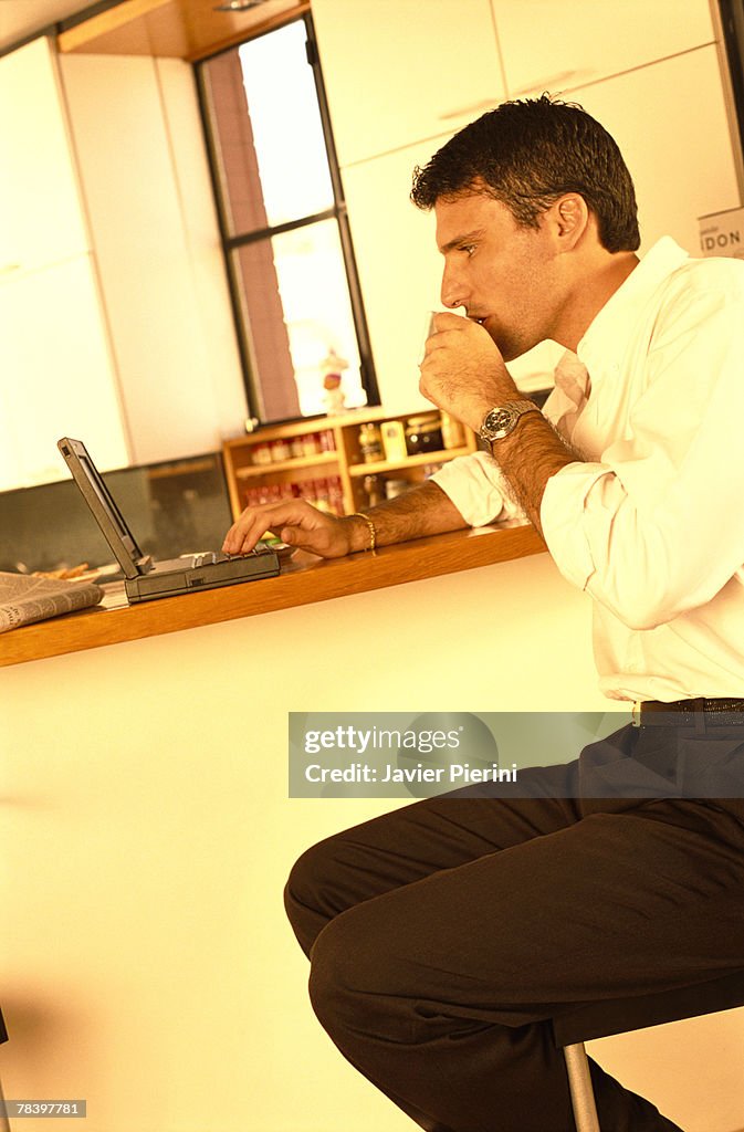 Man working on laptop computer