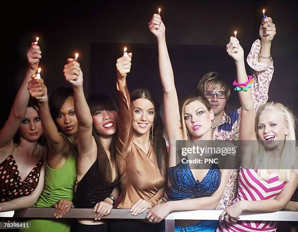 people with lighters at a concert - lighters at concert stock pictures, royalty-free photos & images