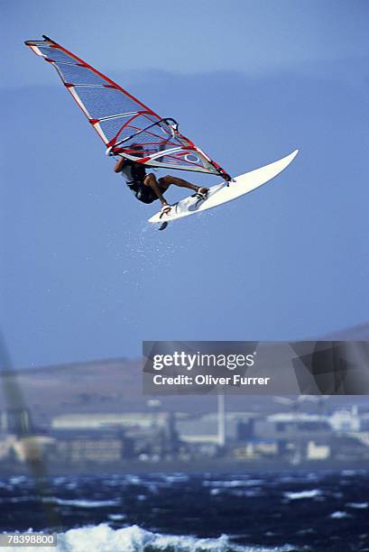 windsurfer jumping - life si a beach stock pictures, royalty-free photos & images