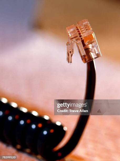 Plug In Phone 113 Phone Cord Plug Stock Photos, High-Res Pictures, and Images - Getty ...