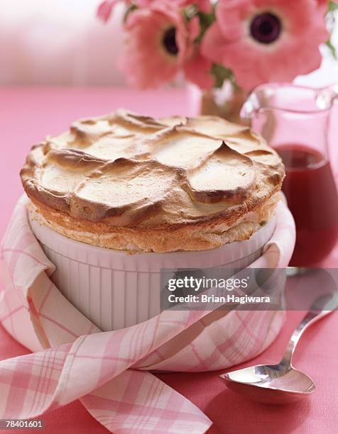 souffle - raspberry coulis stock pictures, royalty-free photos & images