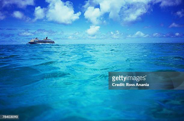 boat on ocean - life si a beach stock pictures, royalty-free photos & images