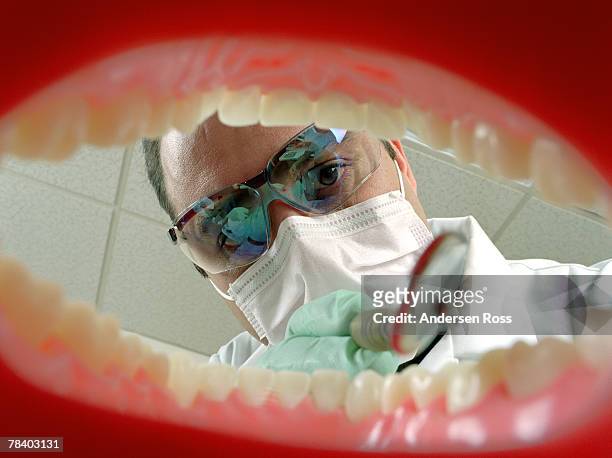 dentist examining mouth - human mouth stockfoto's en -beelden