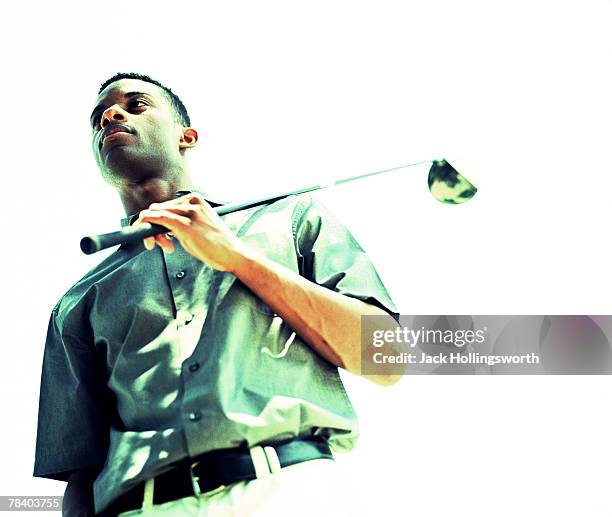 golfer with club - processo cruzado imagens e fotografias de stock