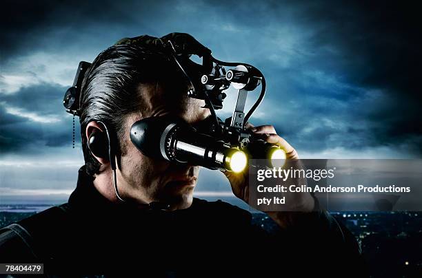 secret agent with high tech gear - secret service agent stock pictures, royalty-free photos & images