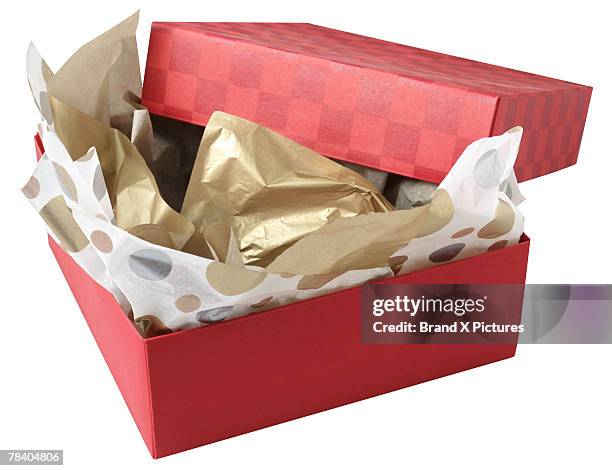 opened christmas gift - unwrapped stock pictures, royalty-free photos & images