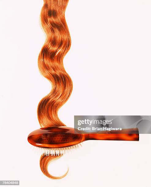 brushing and red hair - rapunzel fotografías e imágenes de stock