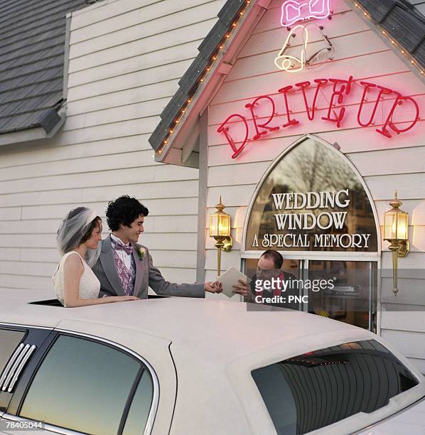 newlyweds at drive-thru wedding chapel - las vegas wedding ストックフォトと画像