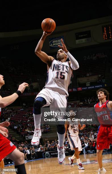 Vince Carter of the New Jersey Nets shoots against the Los Angeles Clippers on December 11, 2007 at the Izod Center in East Rutherford, New Jersey....
