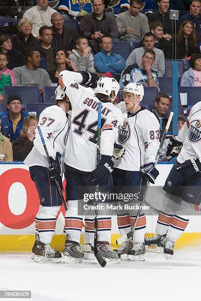 Edmonton Oilers players celebrate a goal against the St. Louis Blues on December 11, 2007 at Scottrade Center in St. Louis, Missouri.