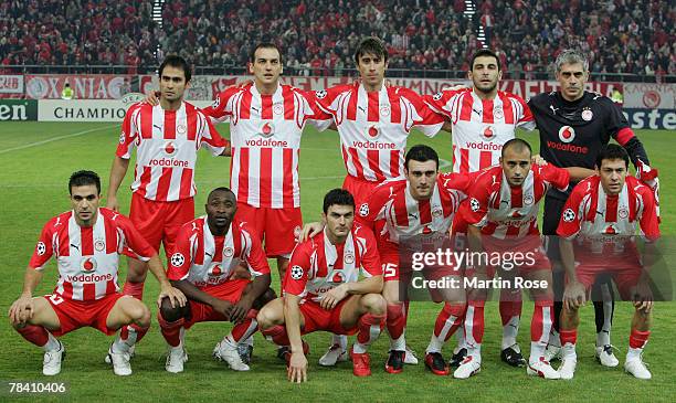 The team of Piraeus lines up prior the UEFA Champions League Group C match between Olympiakos and Werder Bremen at the Karaiskakis Stadium on...