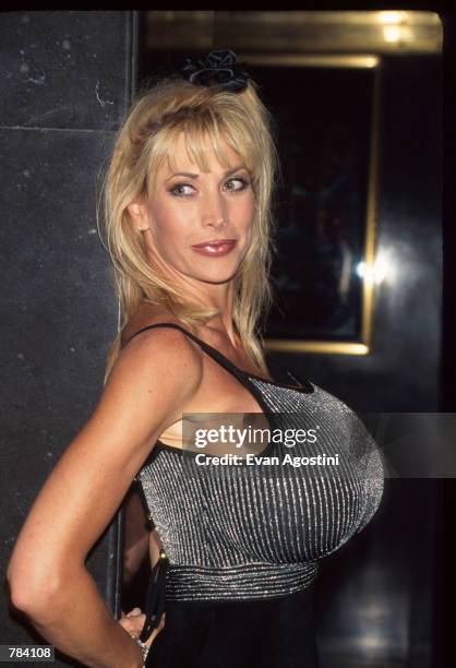 Actress Pandora Peaks attends the premiere of "Striptease" at the Ziegfeld Theater June 23, 1996 in New York City. The film, directed by Andrew...