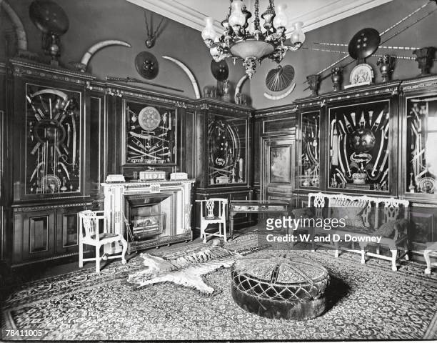 The Indian Room in Buckingham Palace, circa 1930. The chairs are carved from ivory and the swords and daggers are from King Edward VII's collection.