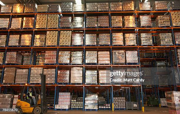 Fork lift truck moves in front of stock about to be sent out at the giant distribution centre in Avonmouth on December 12 2007 near Bristol, England....