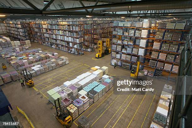 Fork lift trucks move in front of stock about to be sent out at the giant distribution centre in Avonmouth on December 12 2007 near Bristol, England....