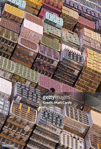 Paul Millwood checks the stock about to be sent out at the giant distribution centre in Avonmouth on December 12 2007 near Bristol, England. The...