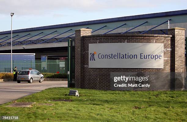 Security personel speak to a car driver at the entrance to the giant distribution centre in Avonmouth on December 12 2007 near Bristol, England. The...
