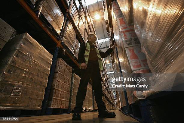 Howard Cobb checks the stock about to be sent out at the giant distribution centre in Avonmouth on December 12 2007 near Bristol, England. The giant...