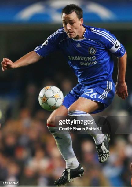 John Terry of Chelsea controls the ball during the UEFA Champions League group B match between Chelsea and Valencia at Stamford Bridge on December...