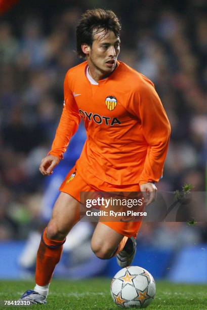 David Silva of Valencia runs with the ball during the UEFA Champions League group B match between Chelsea and Valencia at Stamford Bridge on December...