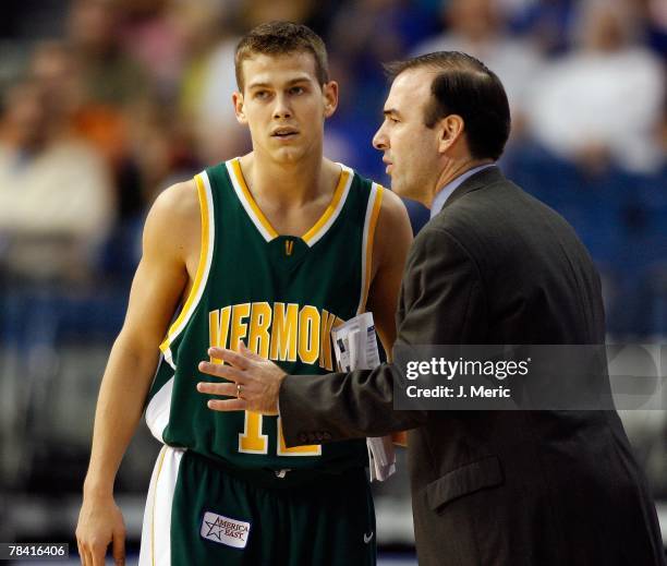 Head Coach Mike Lonergan of the Vermont Catamounts talks with guard Nick Vier during the game against the Florida Gators on November 30, 2007 at the...