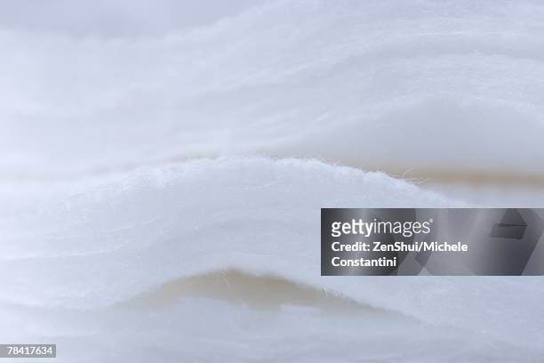 stacked cotton pads, extreme close-up - cotton pad stock pictures, royalty-free photos & images