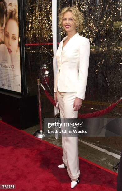Actress Charlize Theron arrives at the premiere of Warner Bros.'' "Sweet November" February 12, 2001 in Westwood, CA.