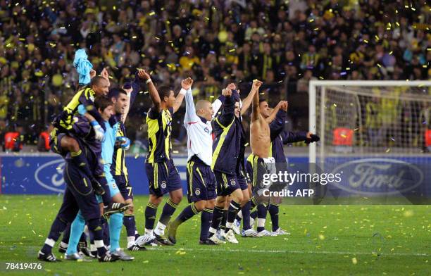Fenerbahce Istanbul's players celebrate after their team-mate Ugur Boral's scored a goal against CSKA Moscow during their Champions League group G...