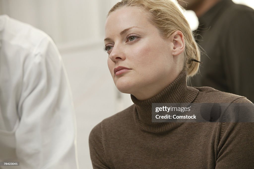 Businesswoman listening during meeting
