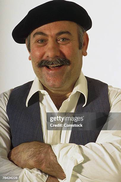 french man posing - beret stock pictures, royalty-free photos & images