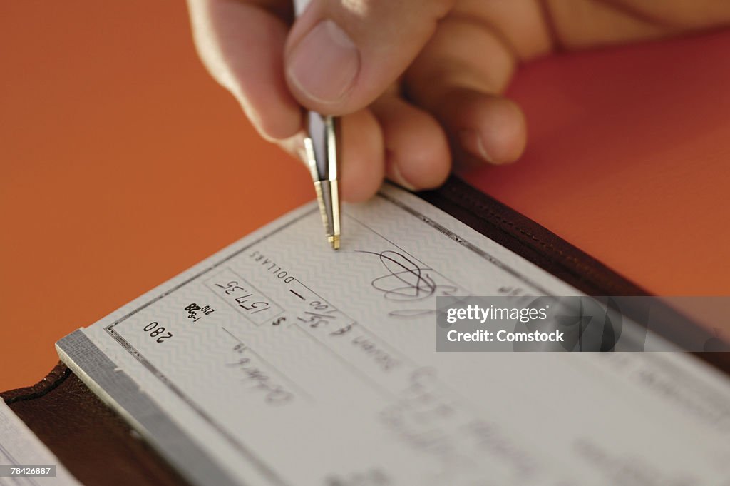 Man Write Check Man Writing Check High-Res Stock Photo - Getty Images