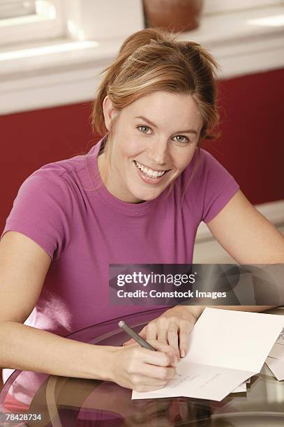 Girl Signing Signing Card Photos and Premium High Res Pictures - Getty Images