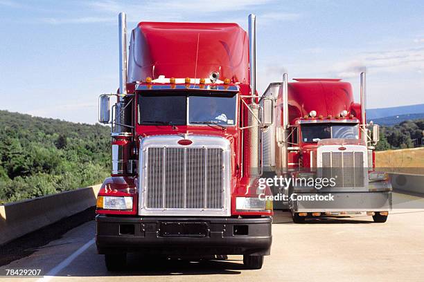 trucks on highway - semi truck front stock pictures, royalty-free photos & images