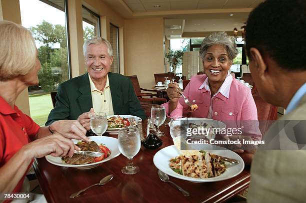 couple at restaurant - black couple dining stockfoto's en -beelden