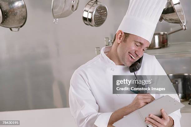 Chef's Notes 200 Chef Taking Notes In Commercial Kitchen Stock Photos, High-Res ...